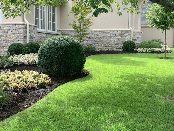 Mulch installation in Lapeer, MI landscape bed