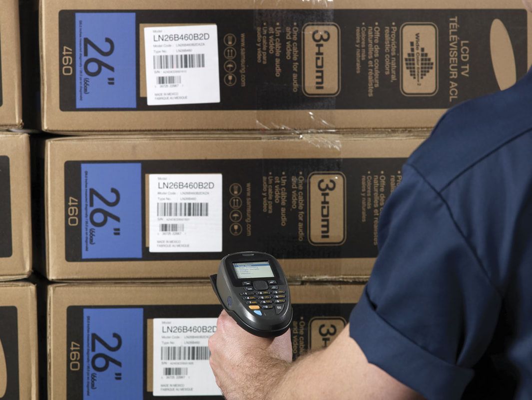 Organized Box Labels Being Scanned