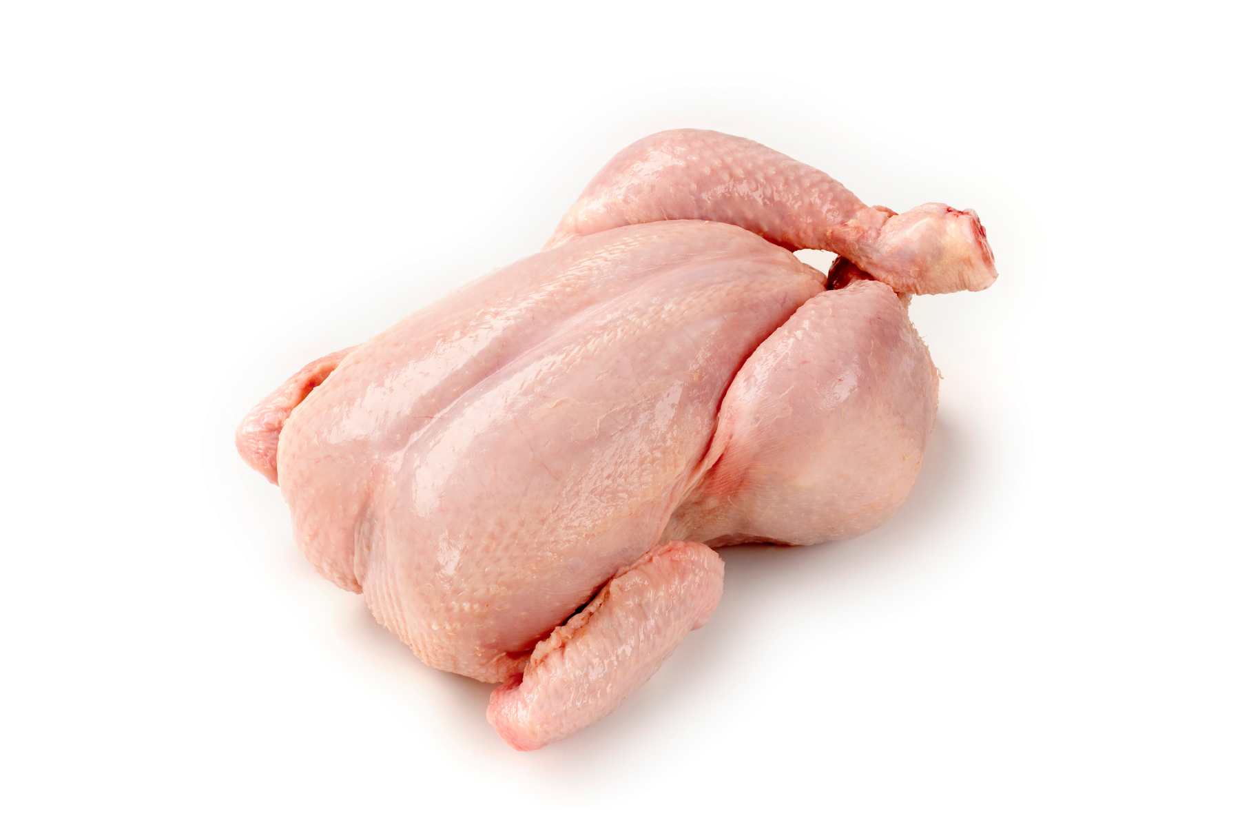 A raw, whole chicken on a white background.