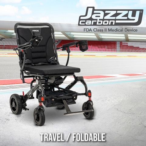 Person seated in a wheelchair entering a van via a side lift