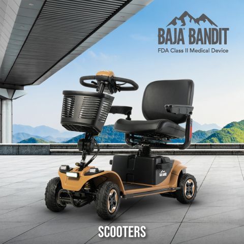 A hand grips a black motorized wheelchair joystick controller on a blue seat