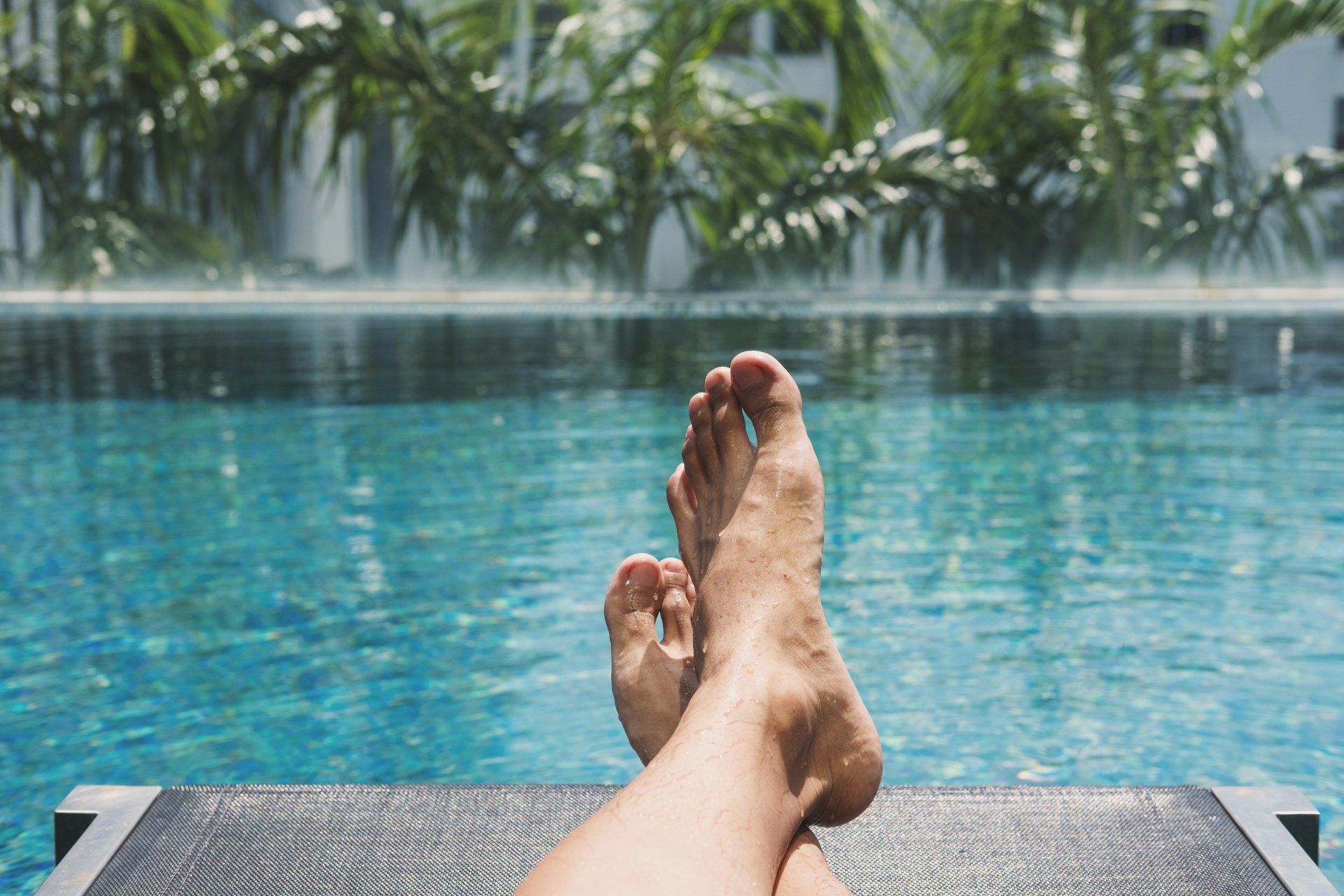 feet by the pool