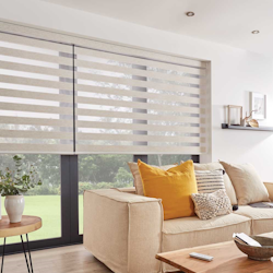 A Living Room With a Couch, Table, and Window With Blind — Curtain Force NQ in Garbutt, QLD