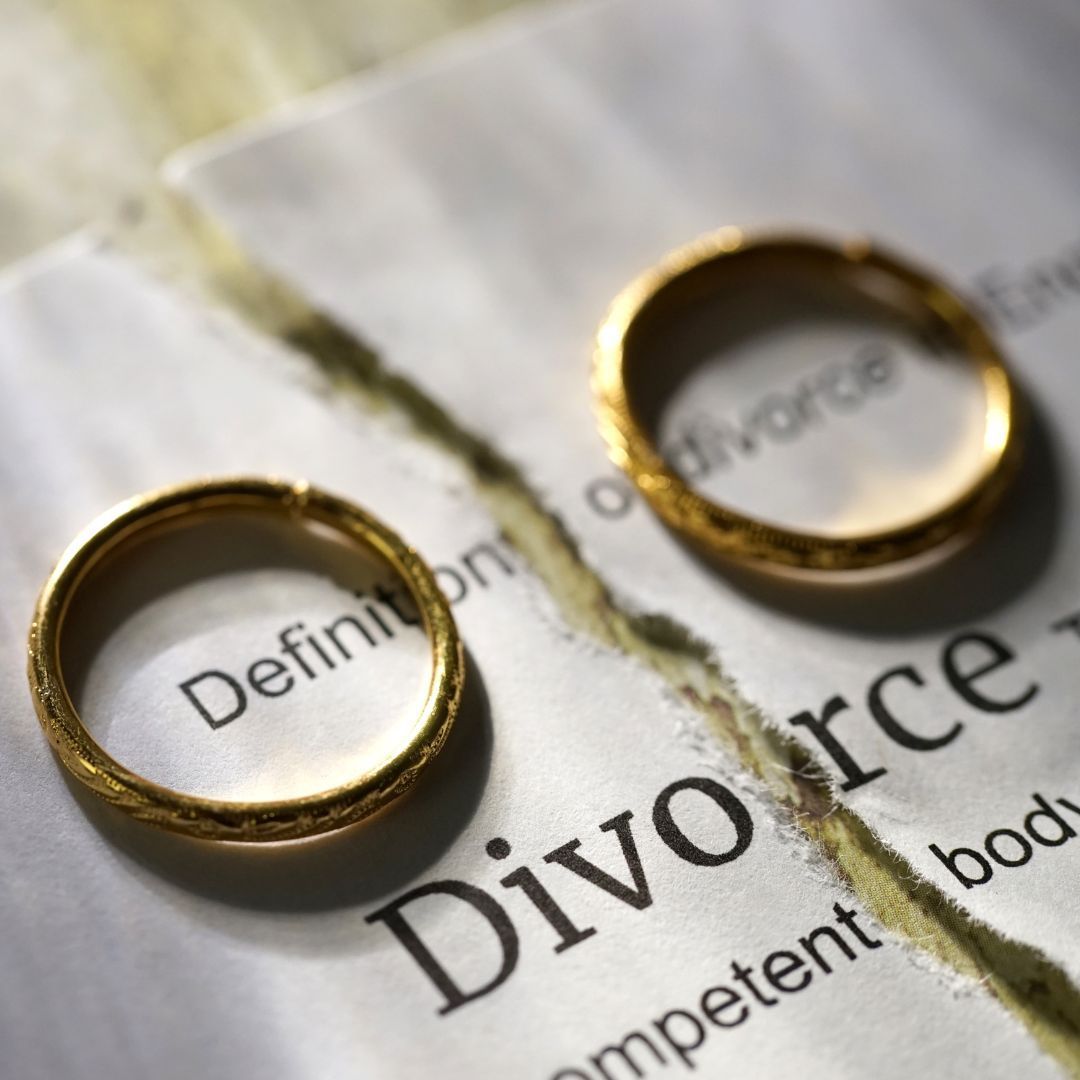 two wedding rooms with a ripped paper that says divorce underneath