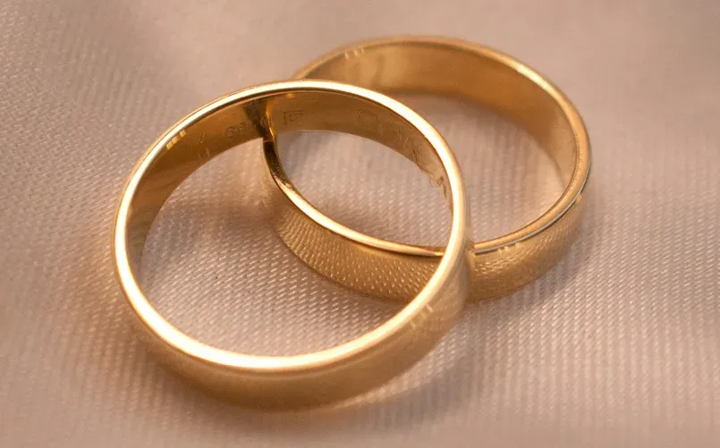 two gold wedding bands