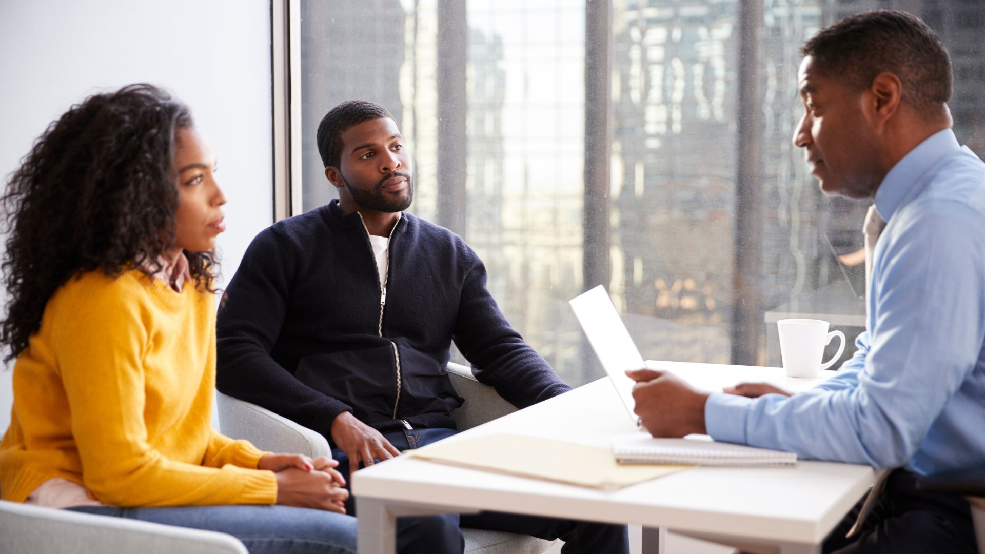 couple with divorce mediator 