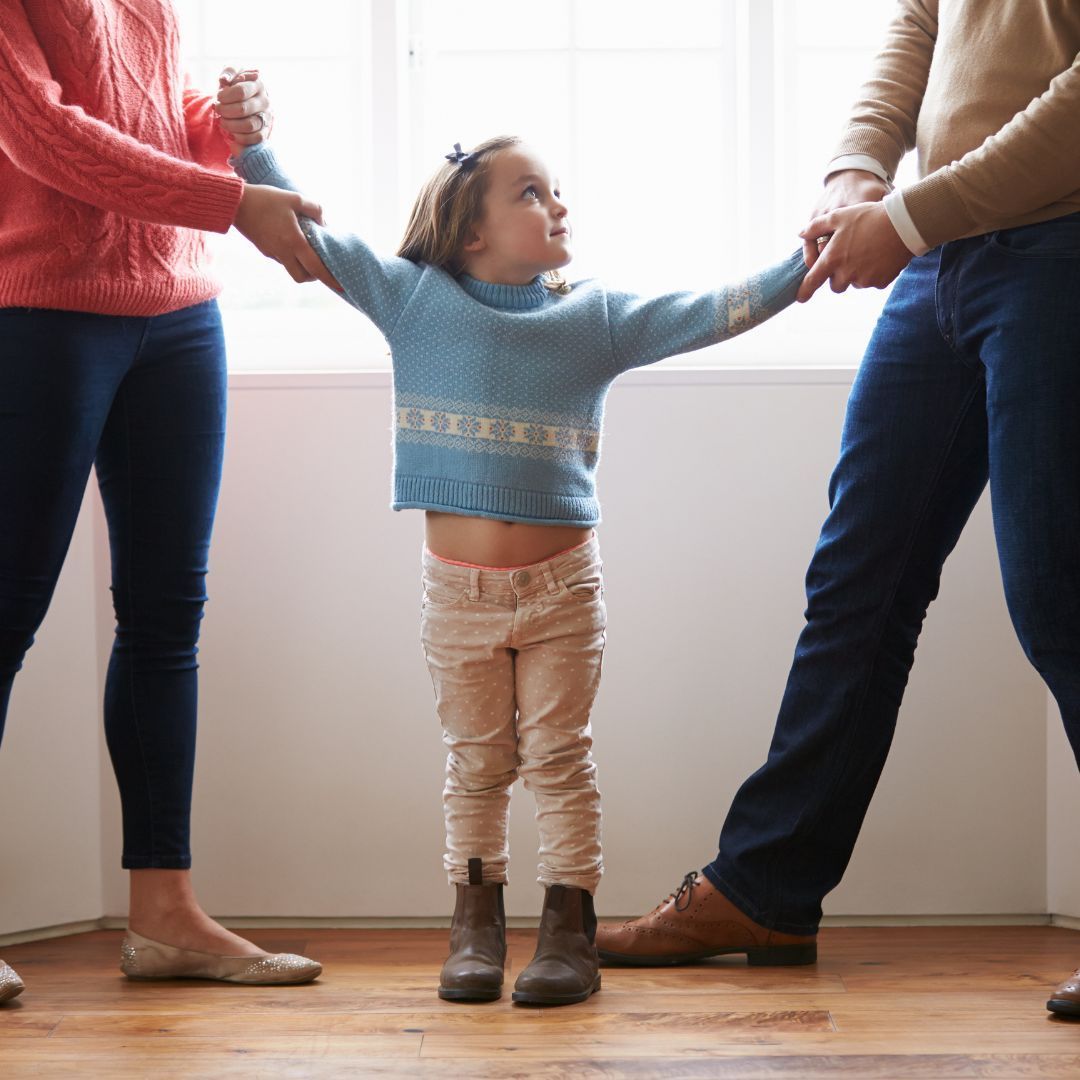 parents on either side of a child
