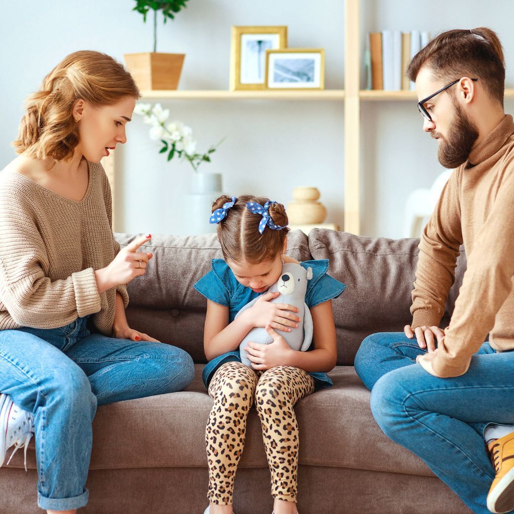 both parents talking to their child
