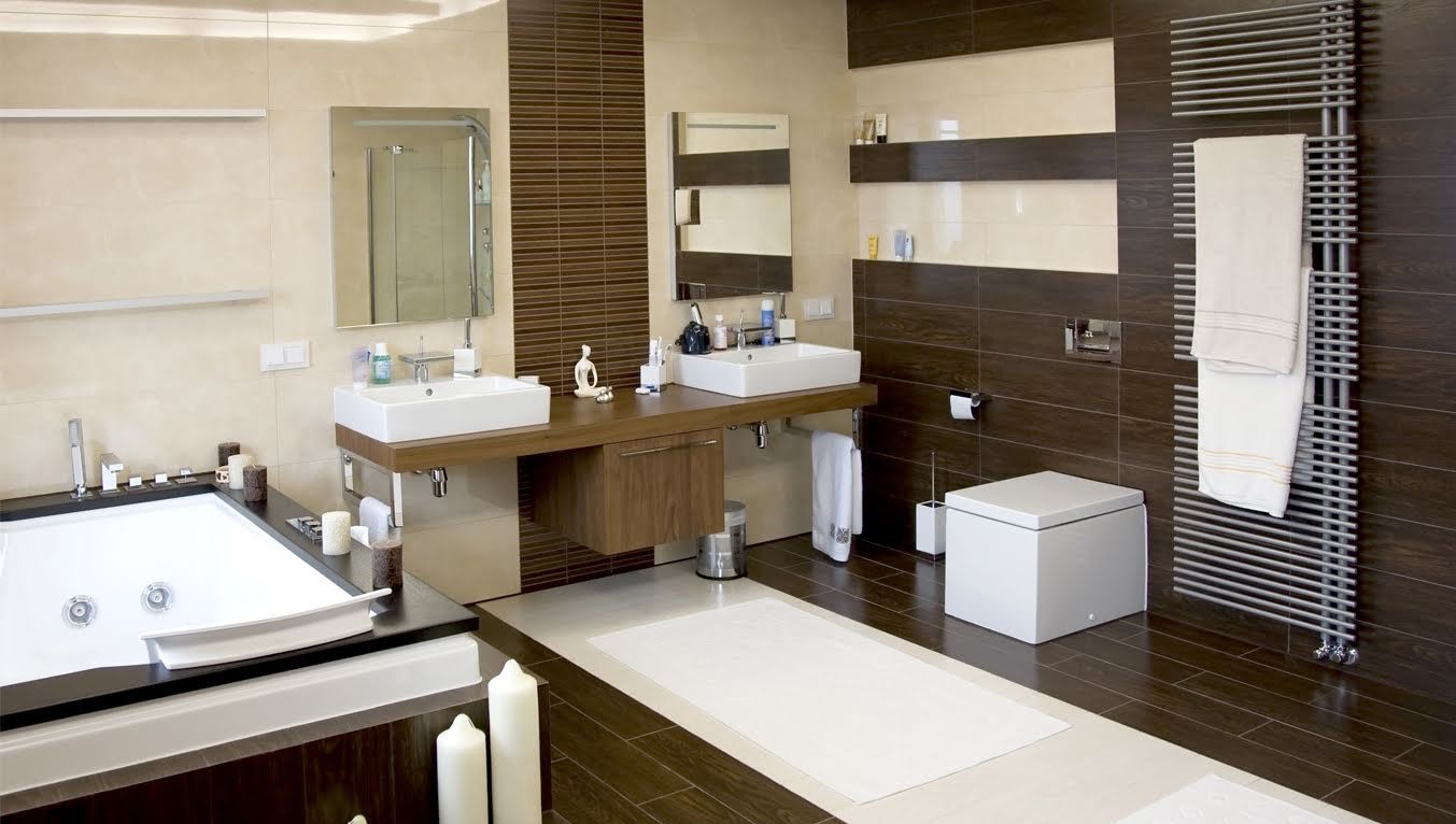 Modern bathroom with dual sinks, a bathtub, and dark brown tiled walls.