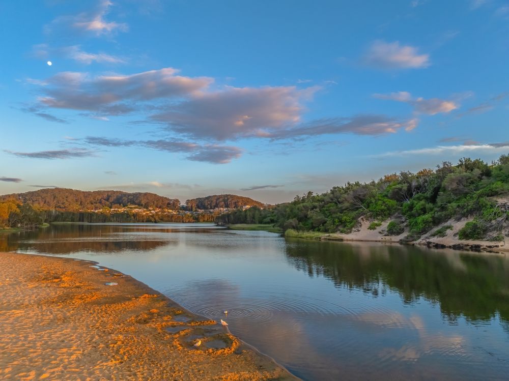 Calm River at Sunset With Rocky Shore — Gutterworx in Wamberal, NSW