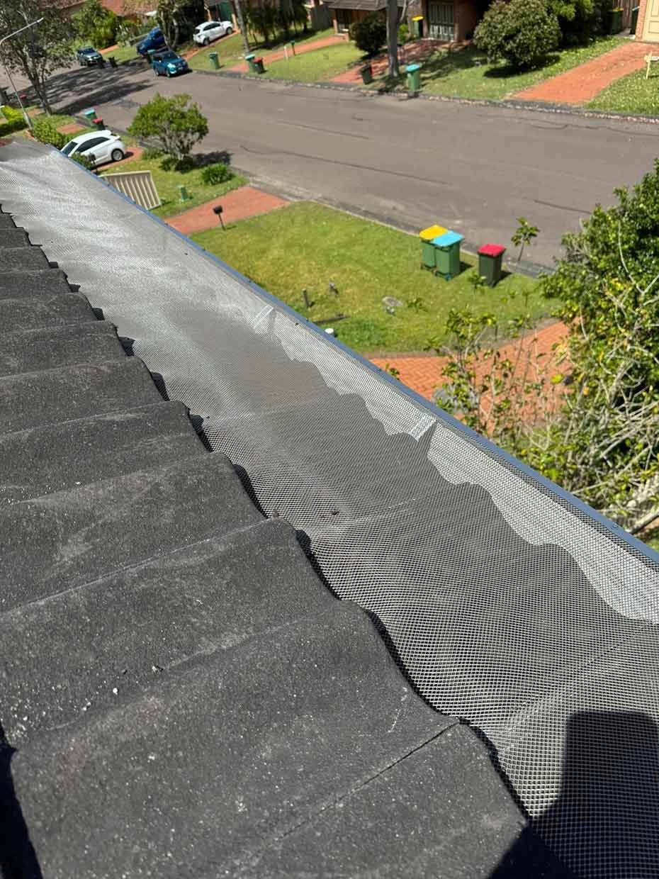 A Roof With a Gutter on It and a Drain on the Side of It — Gutterworx in Bateau Bay, NSW