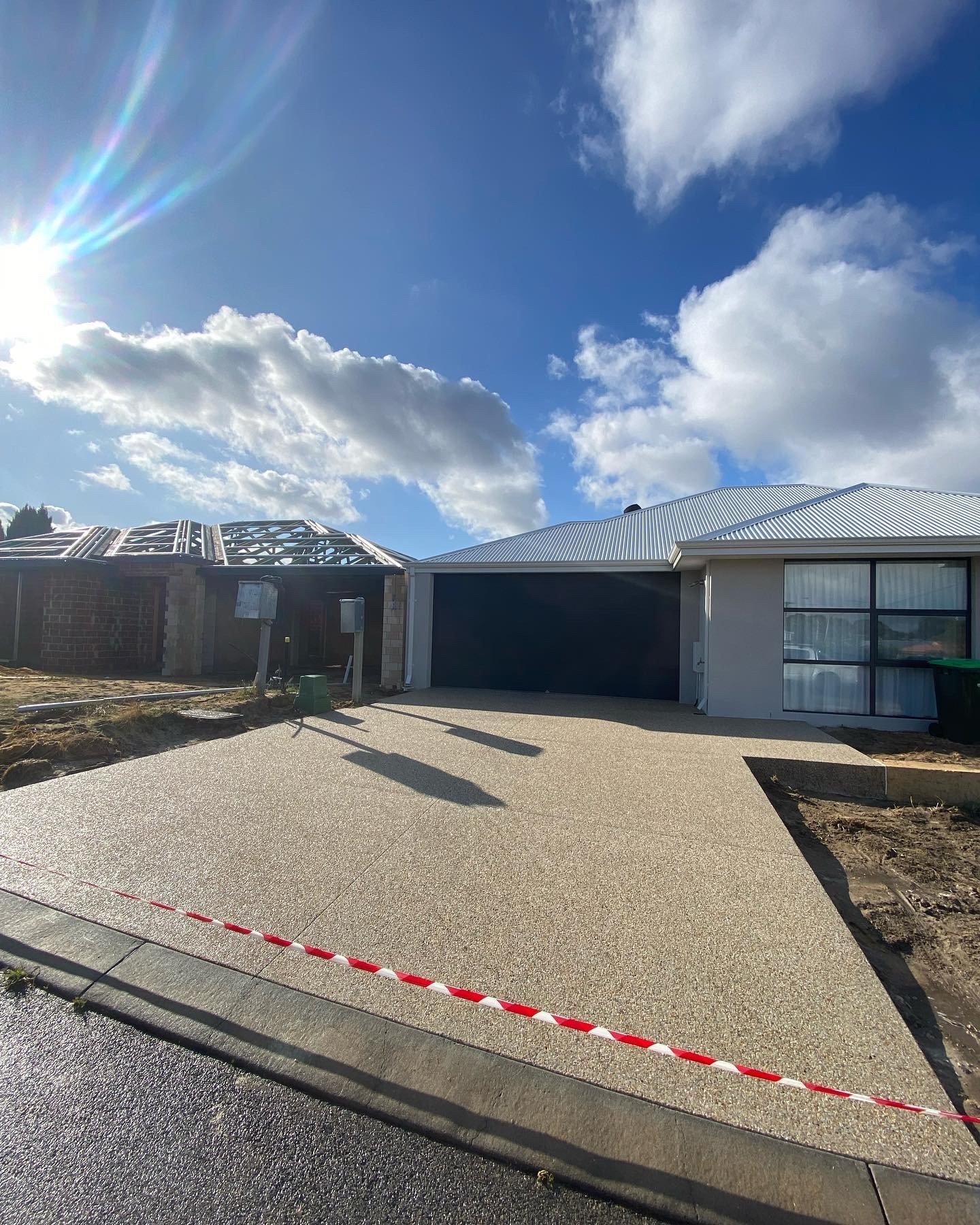Exposed aggregate city of swan swan concrete pros