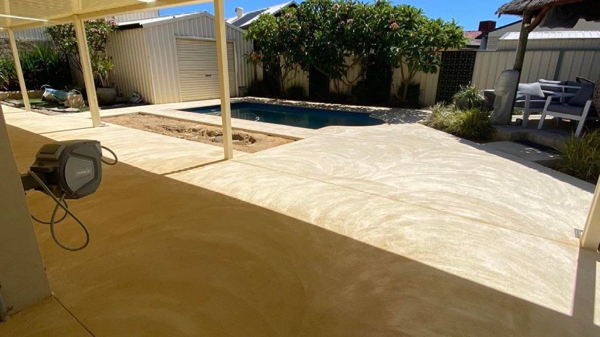 Liquid limestone around pool and under patio