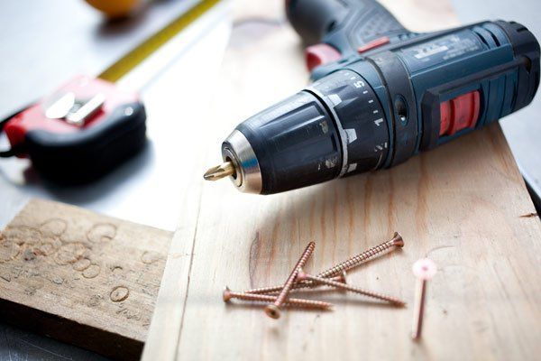 drill and construction for Chet's Roofing in Seattle, Washington