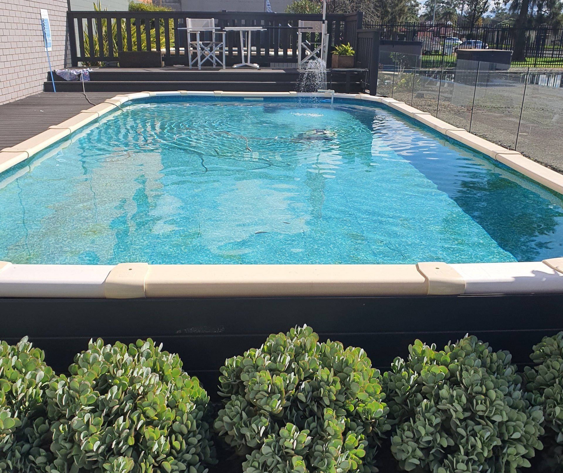 Outdoor Lap Pool— Pool Installation in Macquarie Fields, NSW Outdoor Lap Pool— Pool Installation in Macquarie Fields, NSW