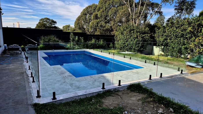 Clean Swimming Pool — Pool Installation in Macquarie Fields, NSW Clean Swimming Pool — Pool Installation in Macquarie Fields, NSW