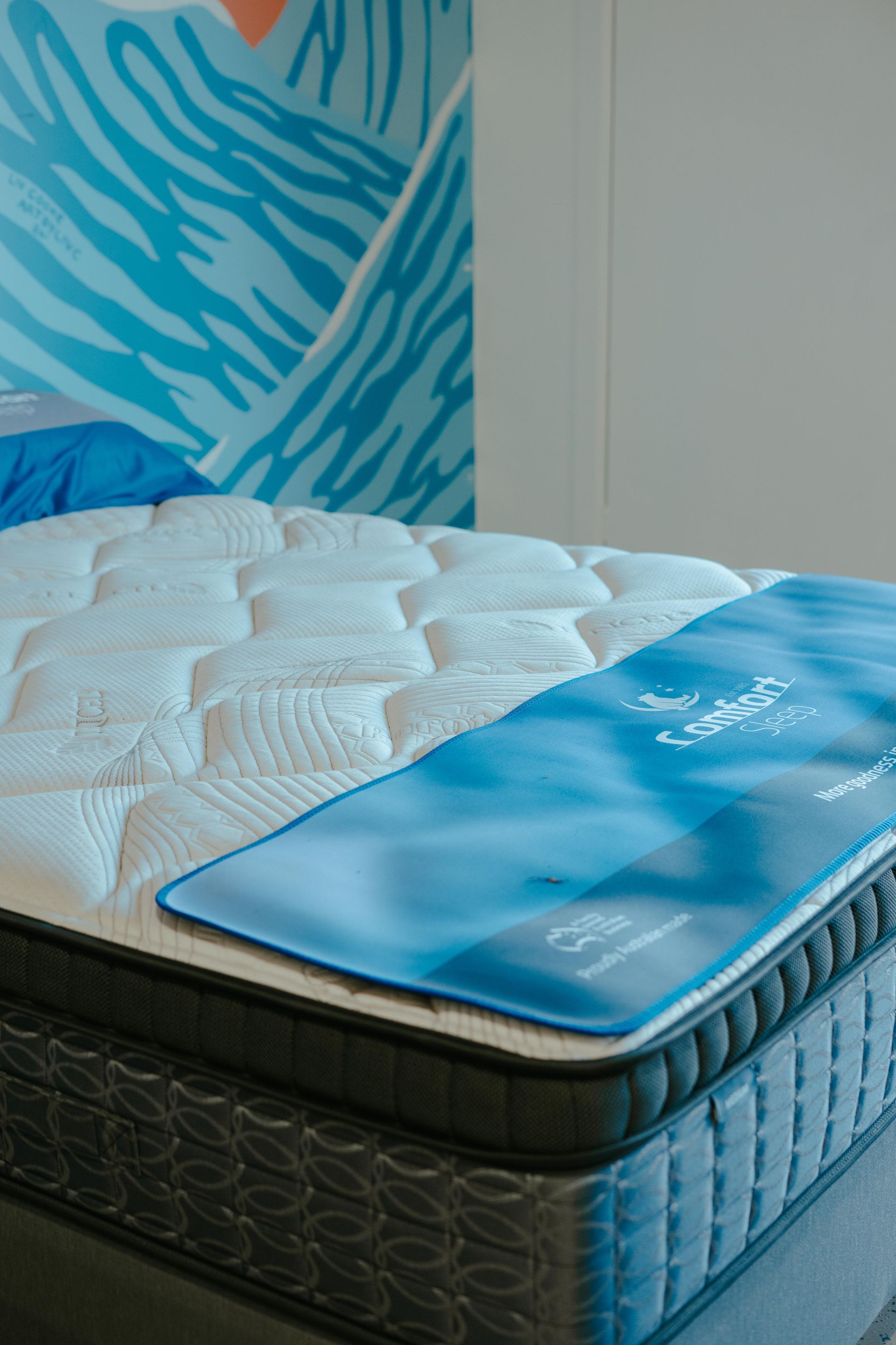 Mattress Display With a White Quilted Top, Blue Branding — Coastal Mattress' Direct in Brisbane, QLD