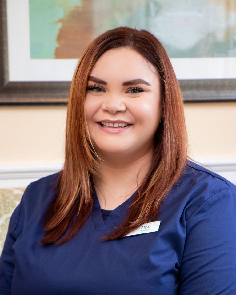 Get root canals, gum disease therapy, and fillings in Coraopolis PA Alexandra smiling at our family dentist practice in Coraopolis PA