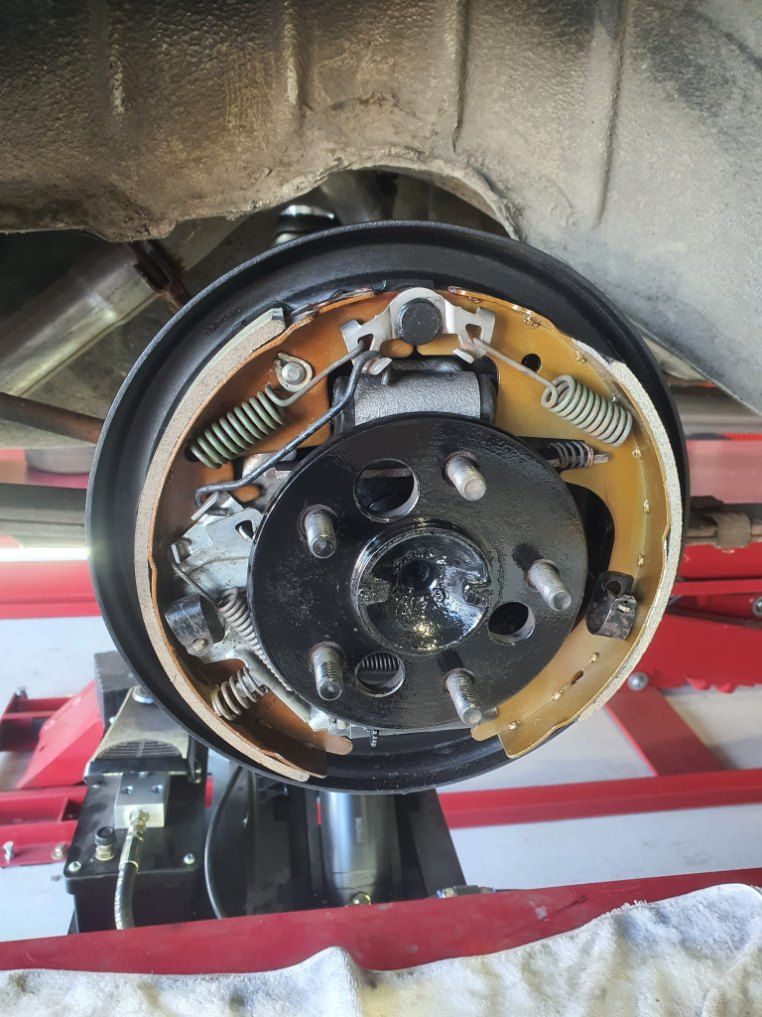 A Close Up of a Brake Caliper on a Car — All Care Car Services Kumho Tyre Platinum Dealer in Kurri Kurri, NSW