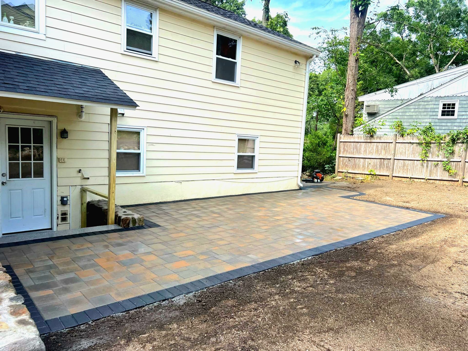 Backyard patio with pavers.