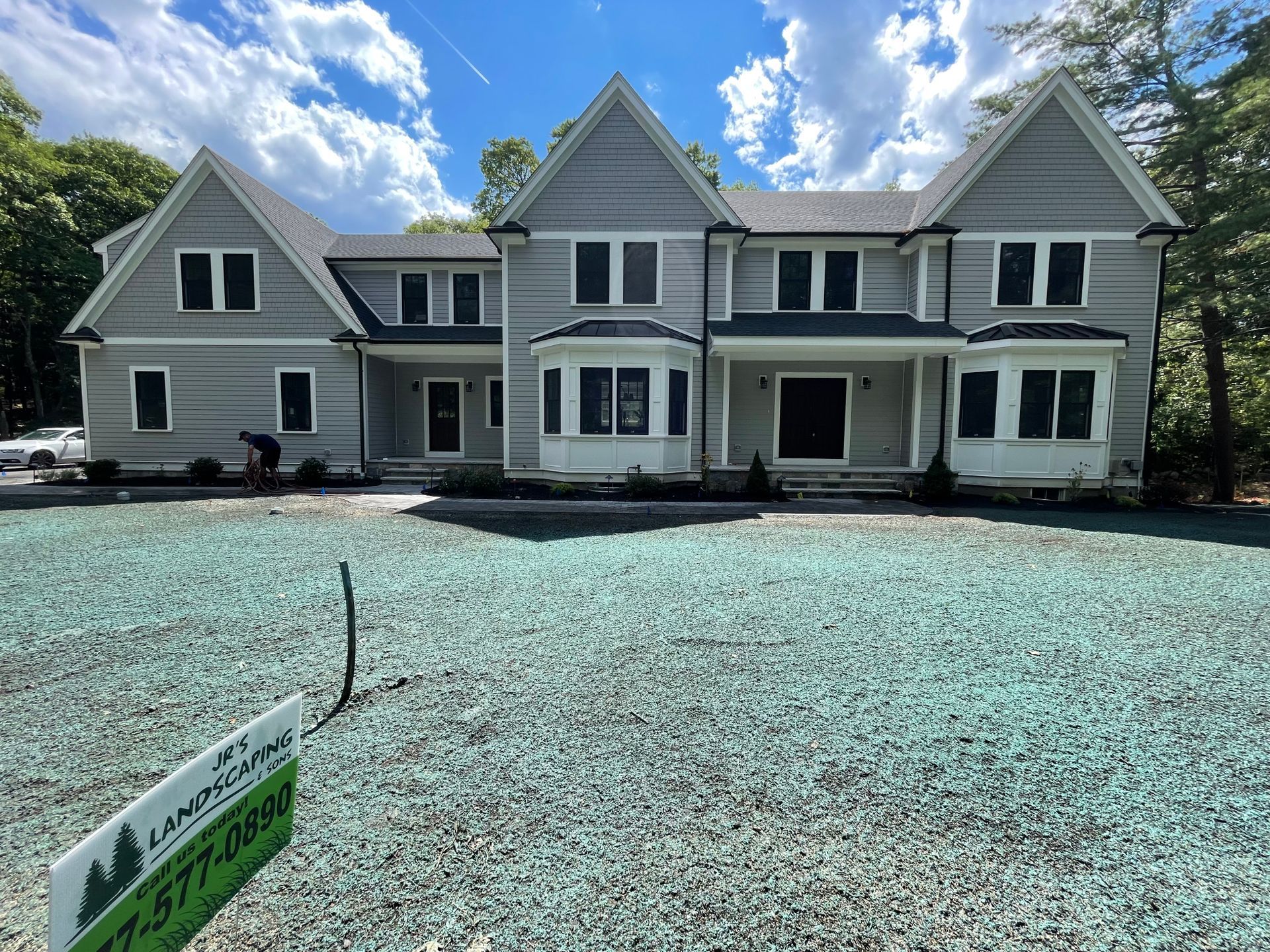 New construction with a brand new walkway, landscape designed beds, and newly installed lawn. 