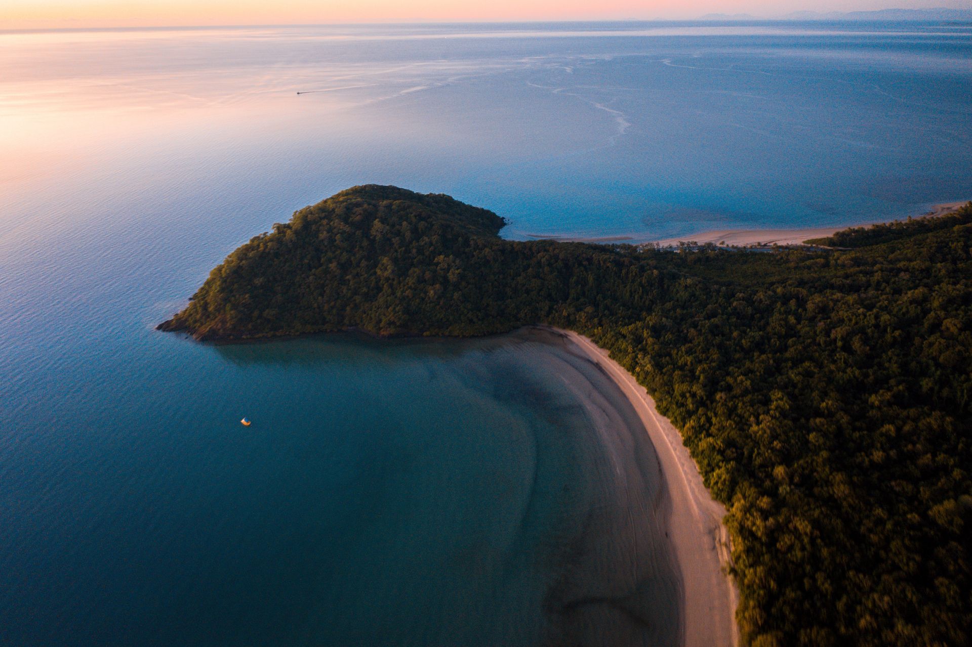 Aerial view of Cape Tribulation in the Daintree Rainforest, where the rainforest meets the reef