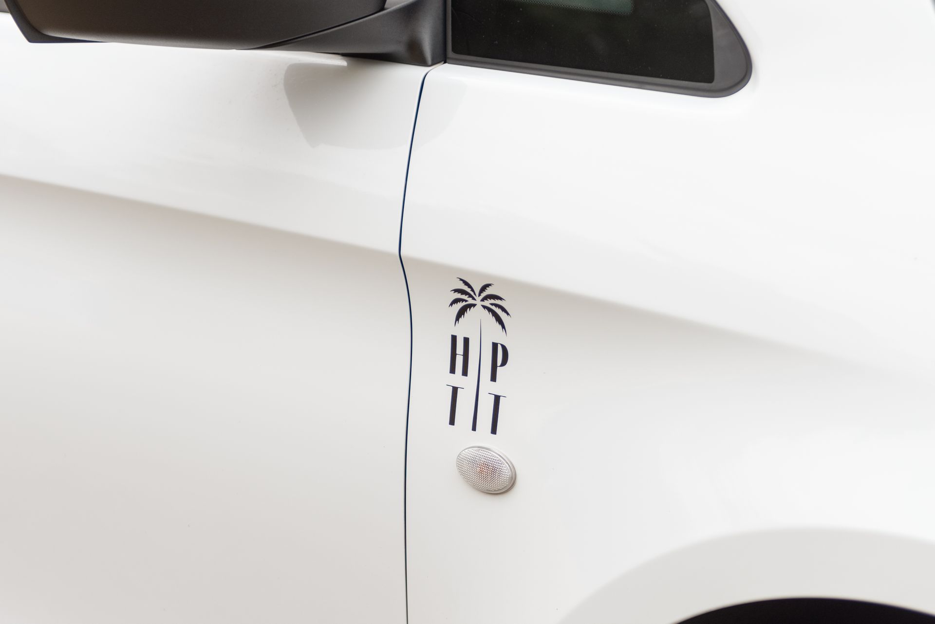 Heather's Private Transfers & Tours logo on her luxury Mercedes Van
