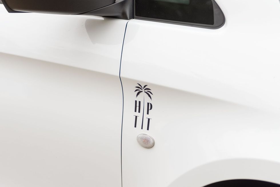 Heather's Private Transfers & Tours logo on her luxury Mercedes Van