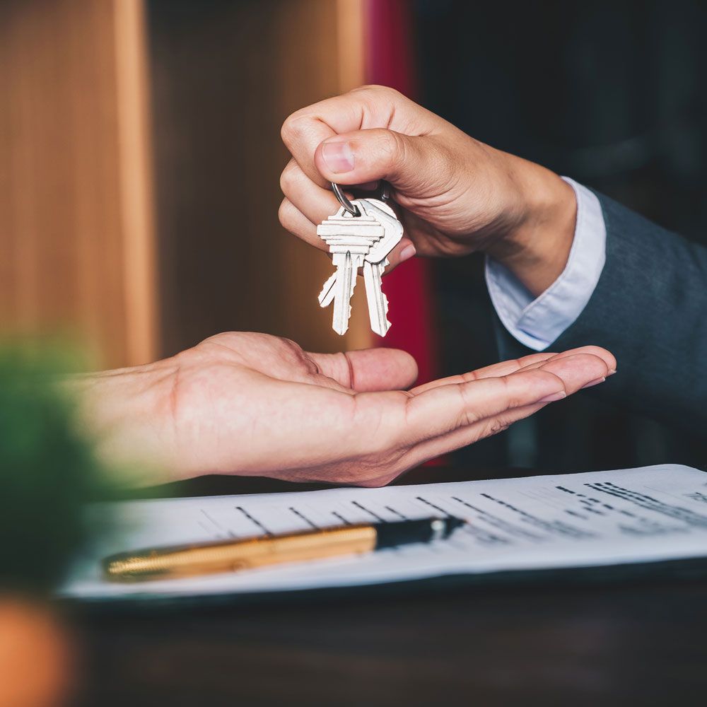 Giving Keys to The New Owner — Oakland, CA — Law Offices of Mark E Rubke