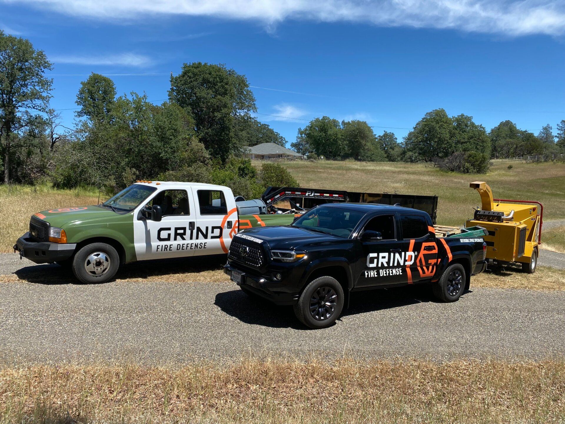 Grind Fire defense hauling away the brush and chips