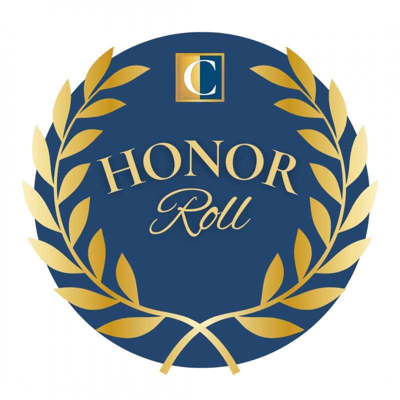 A blue circle with a gold laurel wreath that says honor roll