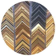 A circular display of various gold and textured picture frame samples.