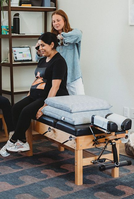 Chiropractic adjustment on a prenatal patient