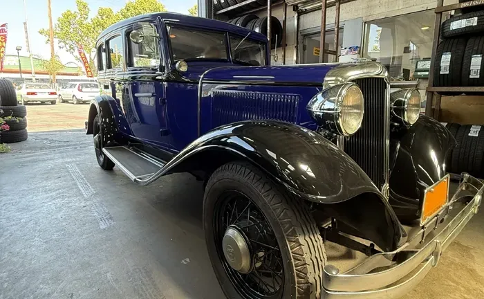 Vintage blue car inside garage in San Leandro, CA | Angel’s Automotive Center