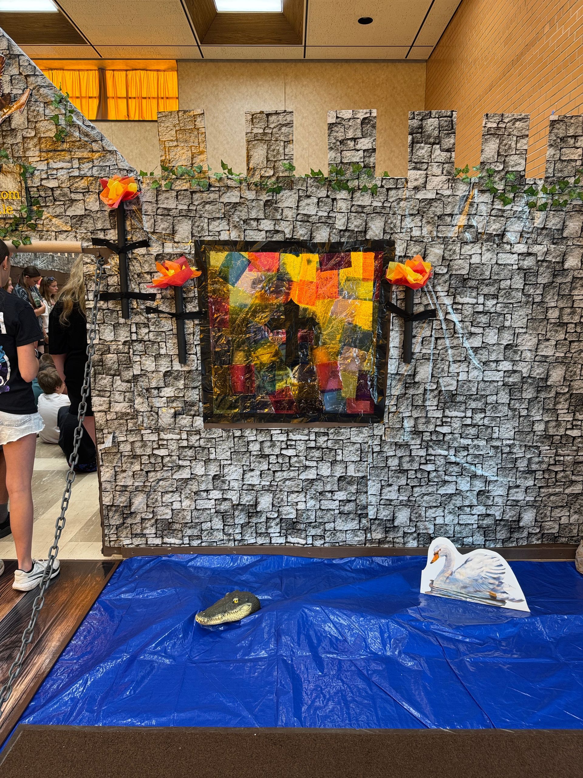Castle-themed display with a blue tarp 