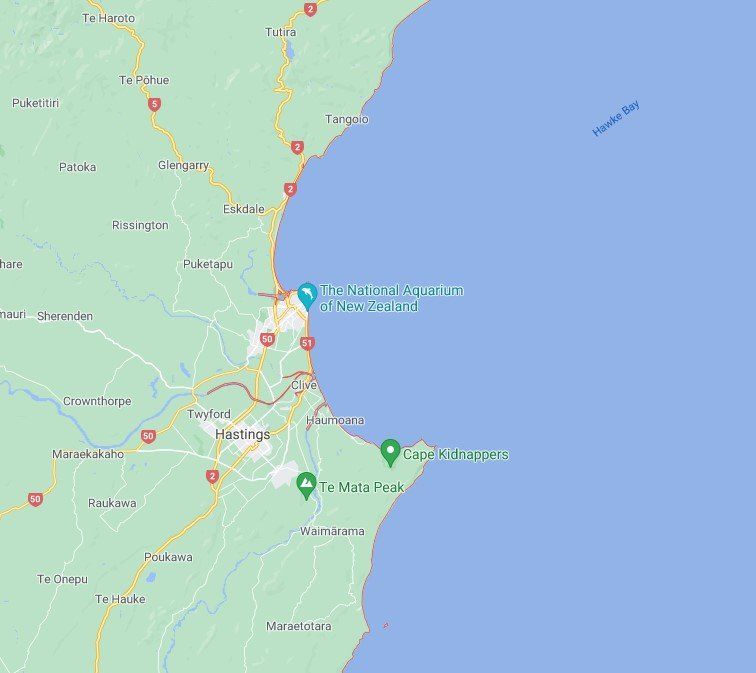 A map showing the location of a city and a beach.