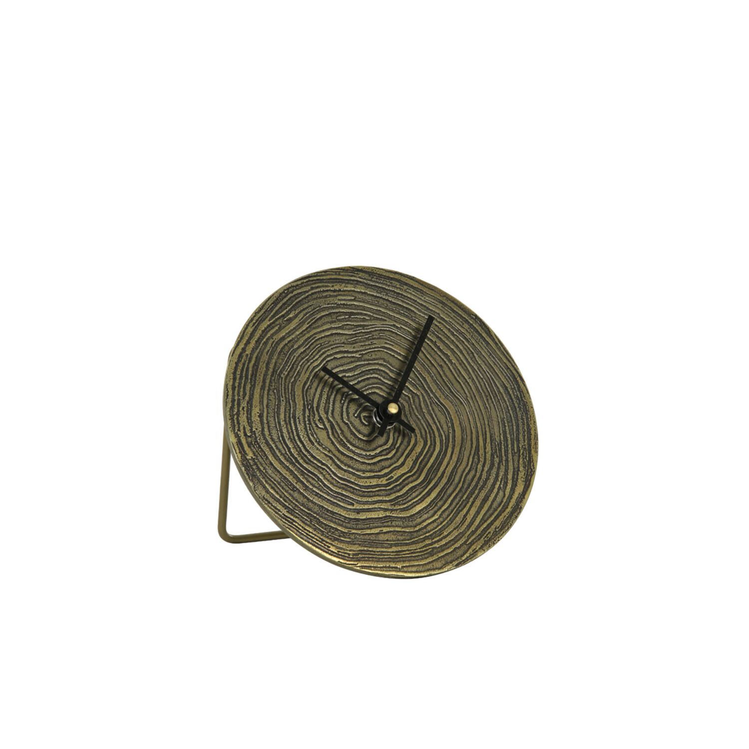 Opgerolde gele tuinslang op een metalen haspel tegen een witte achtergrond.