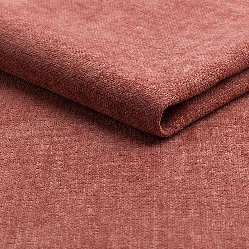 Gevouwen roze-rode, gestructureerde stof, close-up