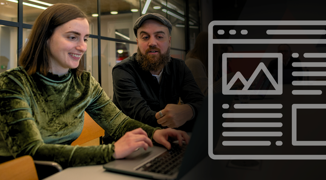 a man and a woman are sitting at a table using a laptop computer .