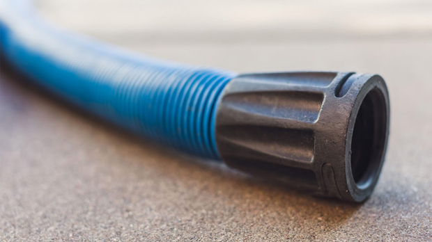 Blue corrugated hose with black connector.