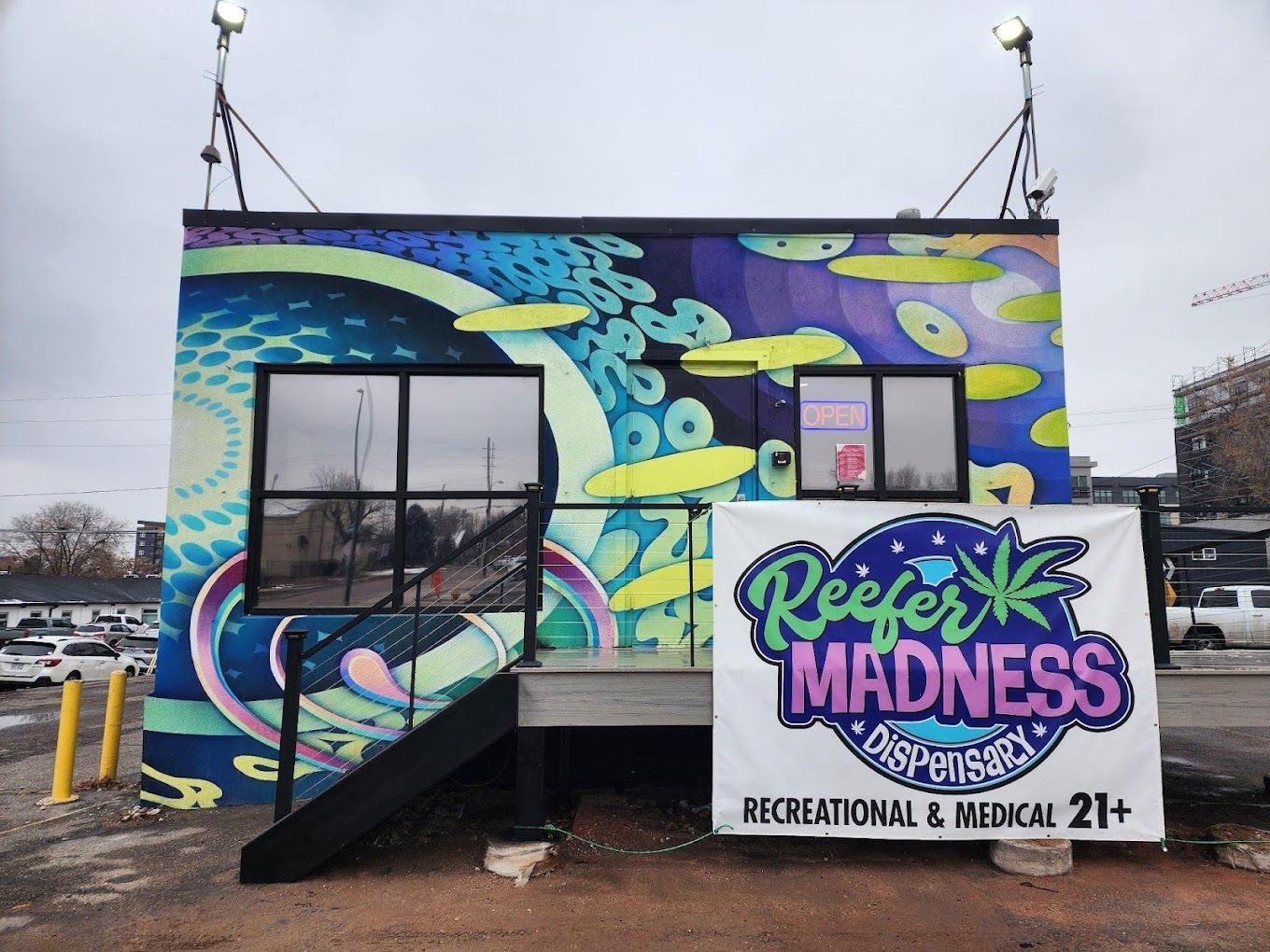 A building with a sign that says reef madness on it