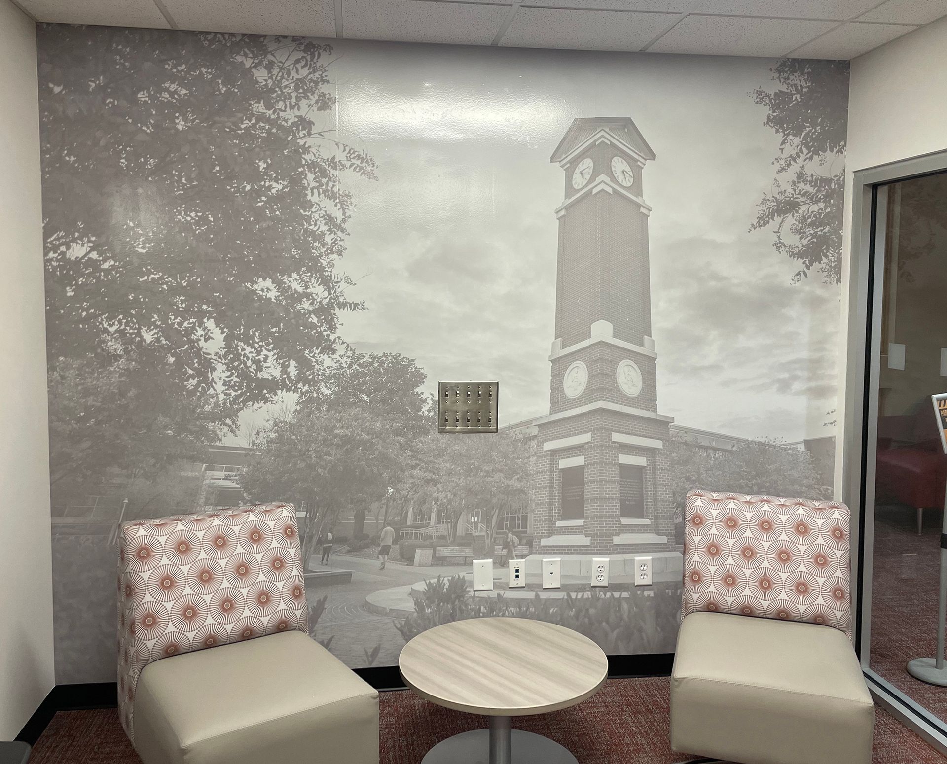High Point Regional Health System and Wake Forest University Medical Center signs on a brick wall
