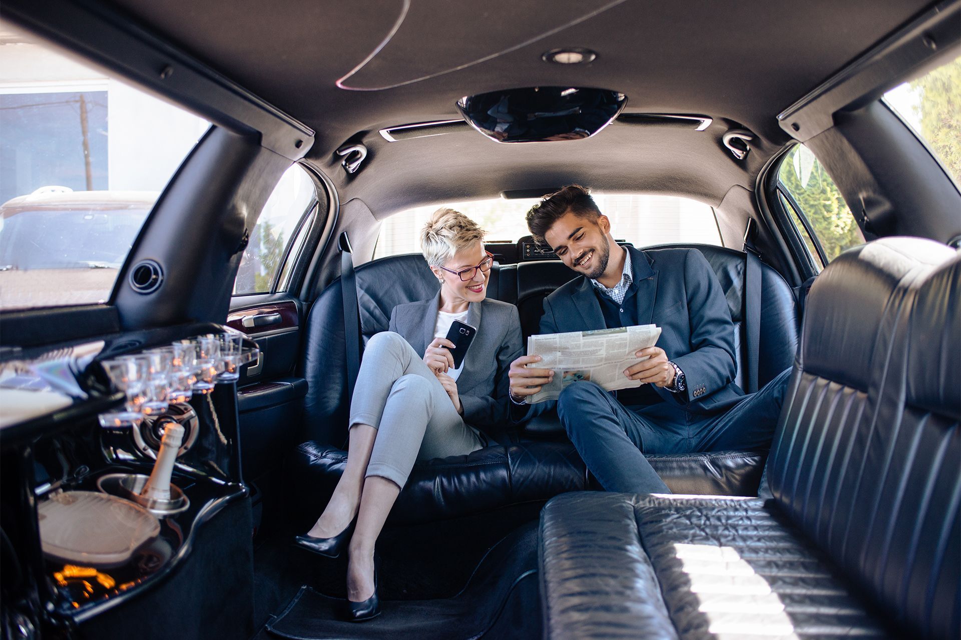 business people in limo