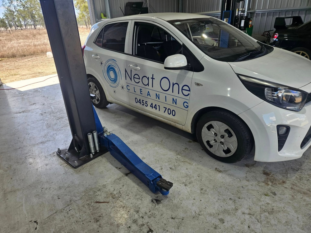 White Car Parked — Cap Coast Maintenance In Alton Downs, QLD