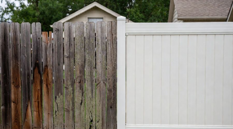 A split-screen comparison of a weathered, decaying wooden fence next to a clean, modern white vinyl fence.