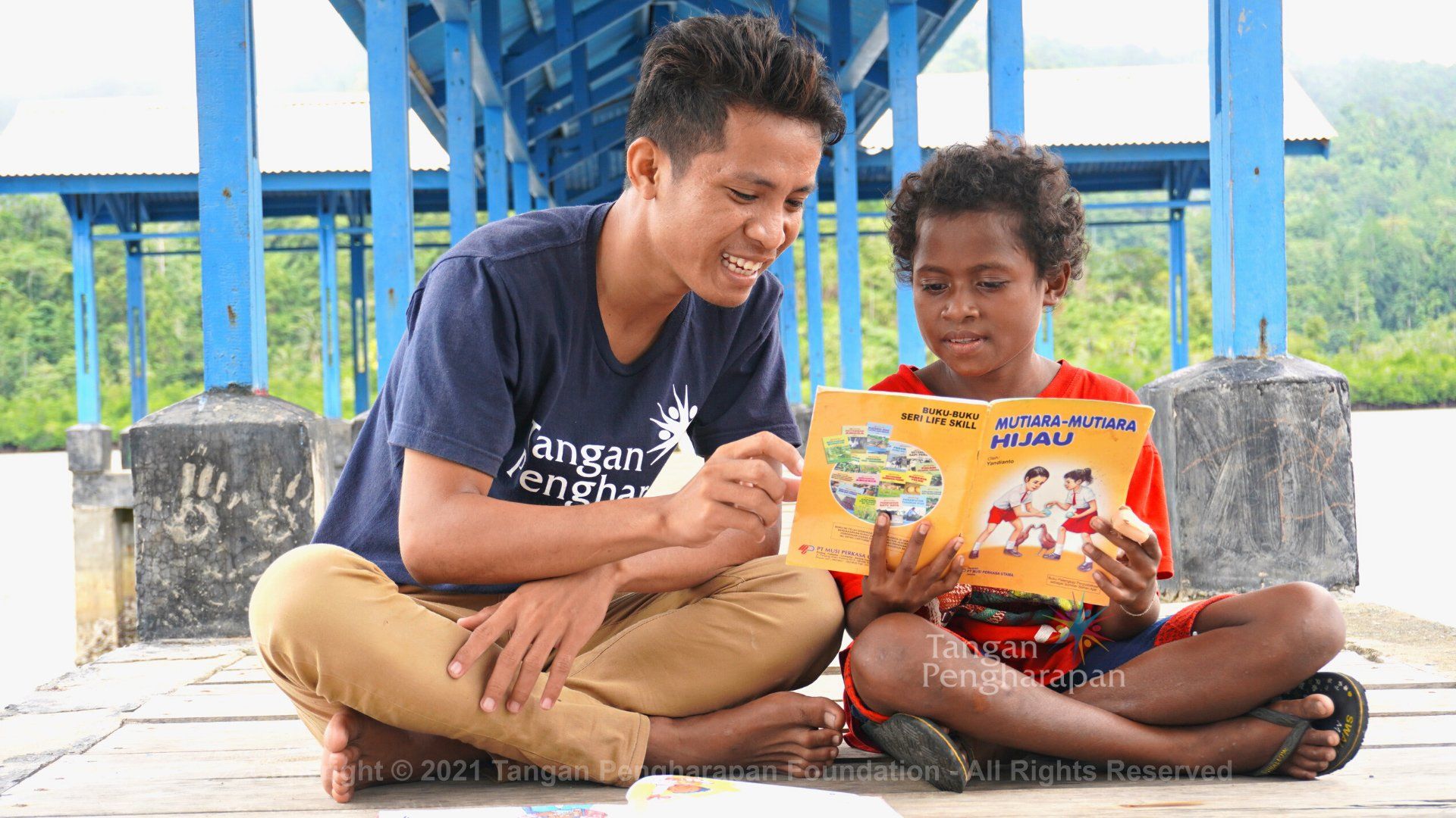 A Man Teaching a Student — Safety Boots in Jakarta Indonesia