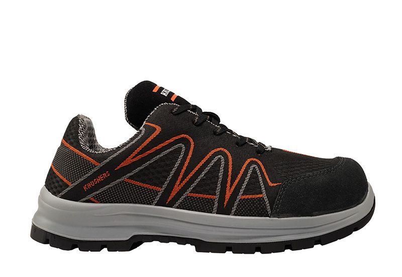 A pair of black and orange safety shoes on a white background.