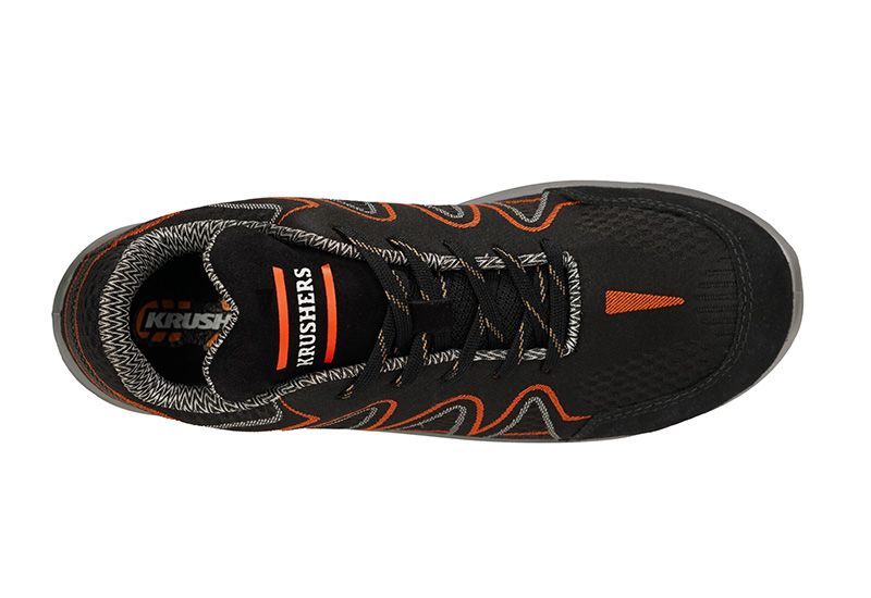 The bottom of a pair of black and orange safety shoes on a white background.
