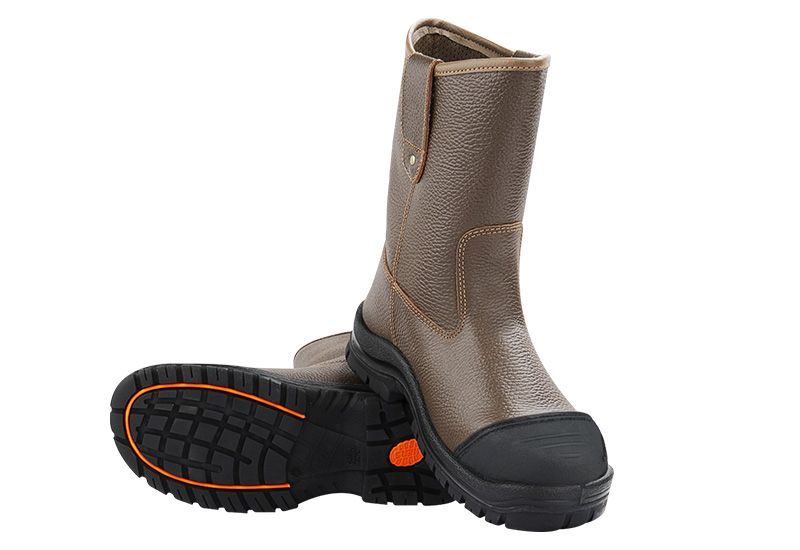 A pair of brown boots with a black sole on a white background.