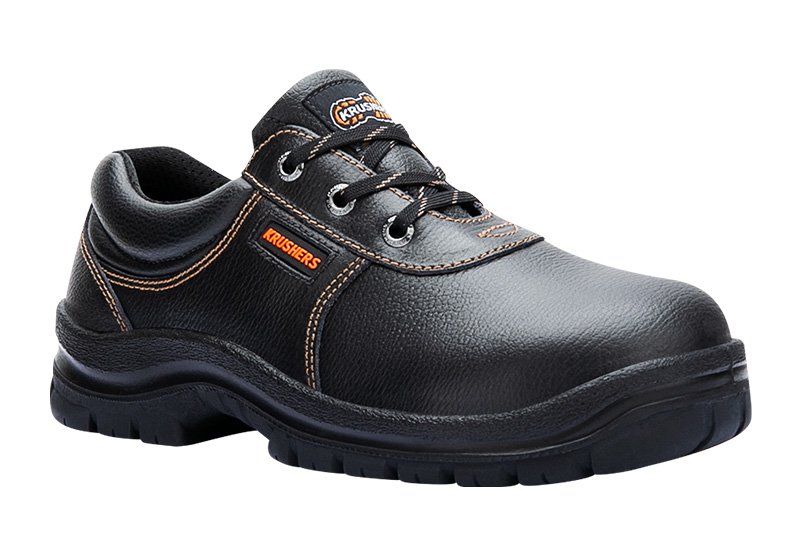 A pair of black and orange safety shoes on a white background.